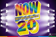 the words 'now that's what I call now 20' reads in large rainbow font with stage lights shining onto it from either side.