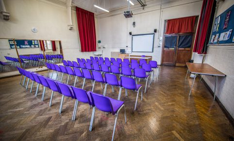 Room with chairs in rows of 5.