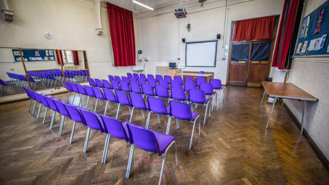 Room with chairs in rows of 5.