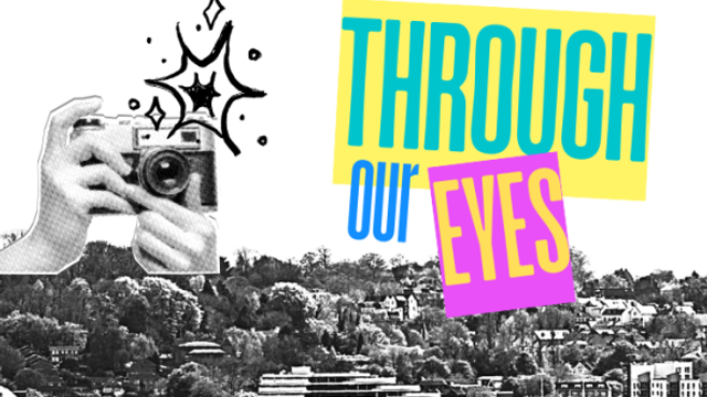 An old fashioned camera being clicked in the foreground. In the background is a black and white image of a city. The logo is on the right hand side with green, blue and yellow writing saying 'Through Our Eyes'.