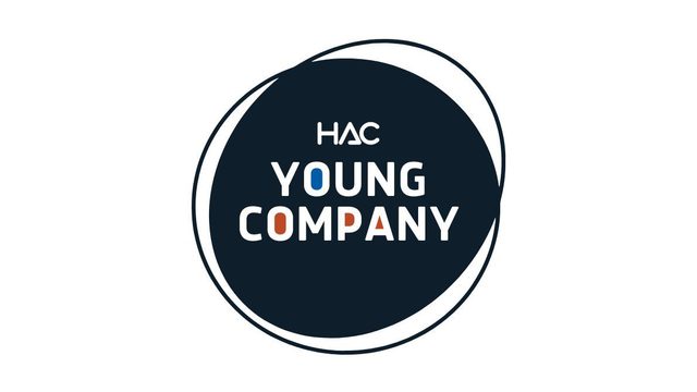 A solid navy circle with HAC logo and Young Company written in the centre in white text