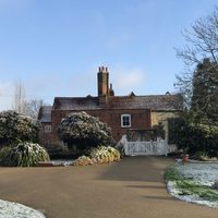 Snow covered manor house.