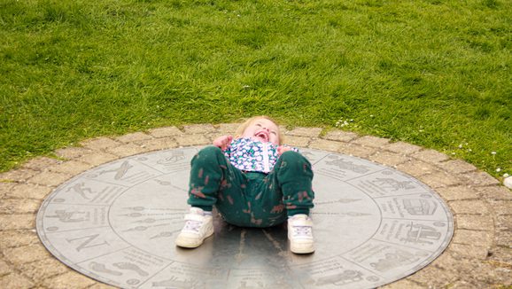 Laughing child on grass